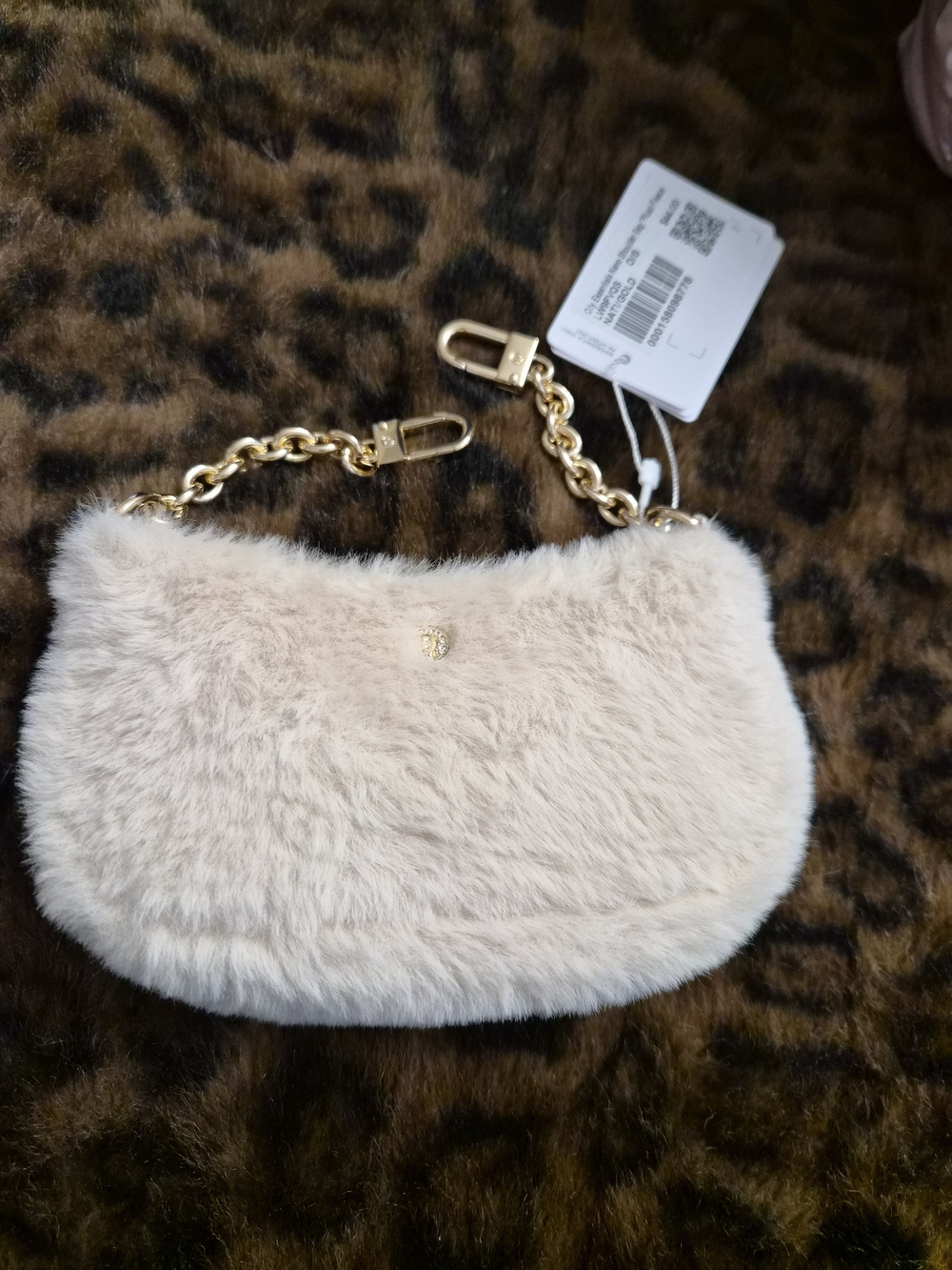 lululemon athletica Plush Faux Fur Nano  in Light Beige with Gold Chain